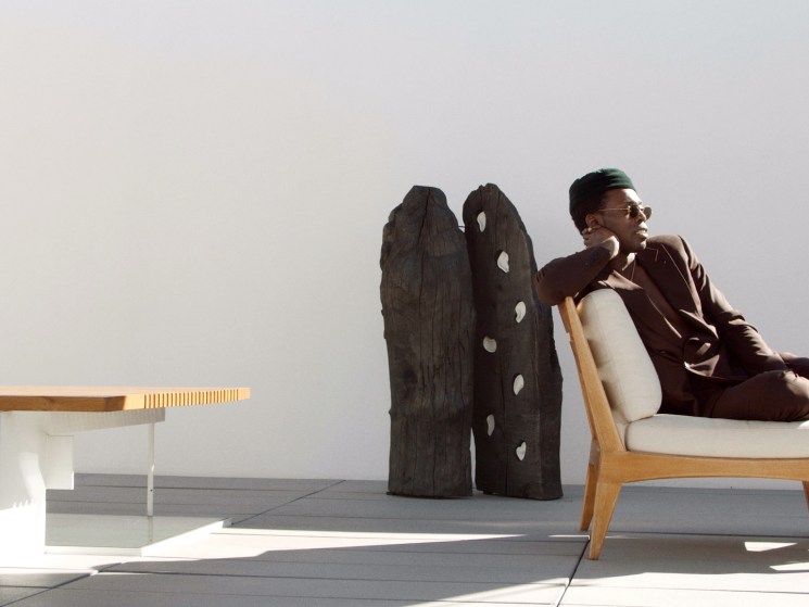 A man sitting on a terrace.