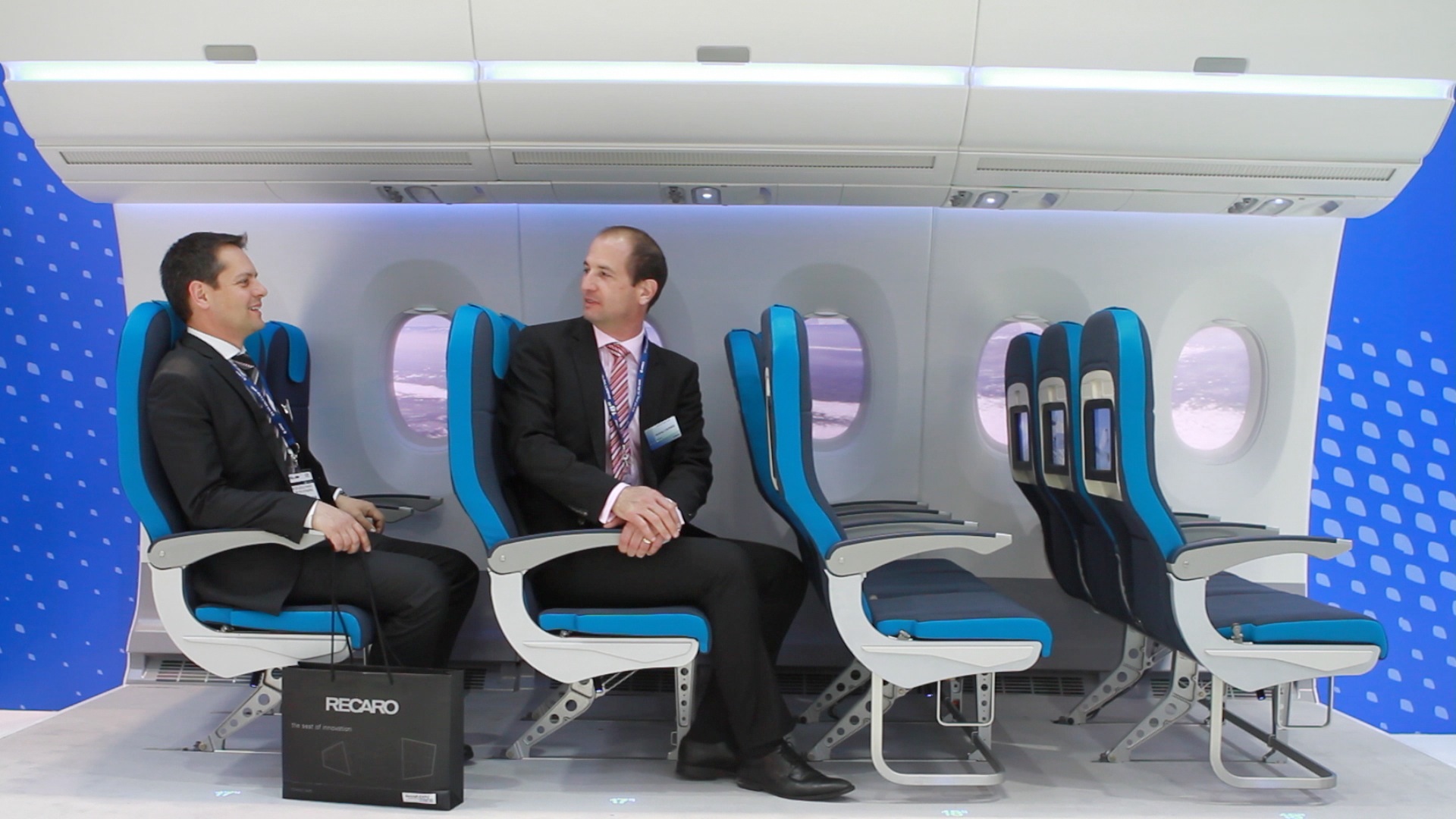Businessmen sitting in a plane set.