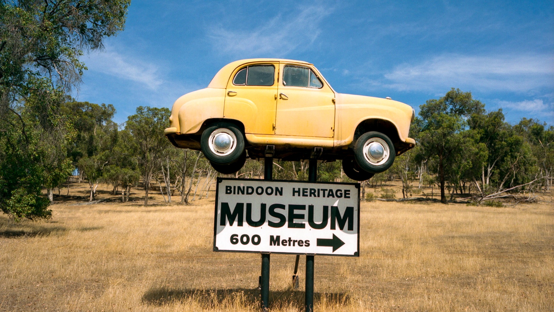 A sign in Australian countryside.