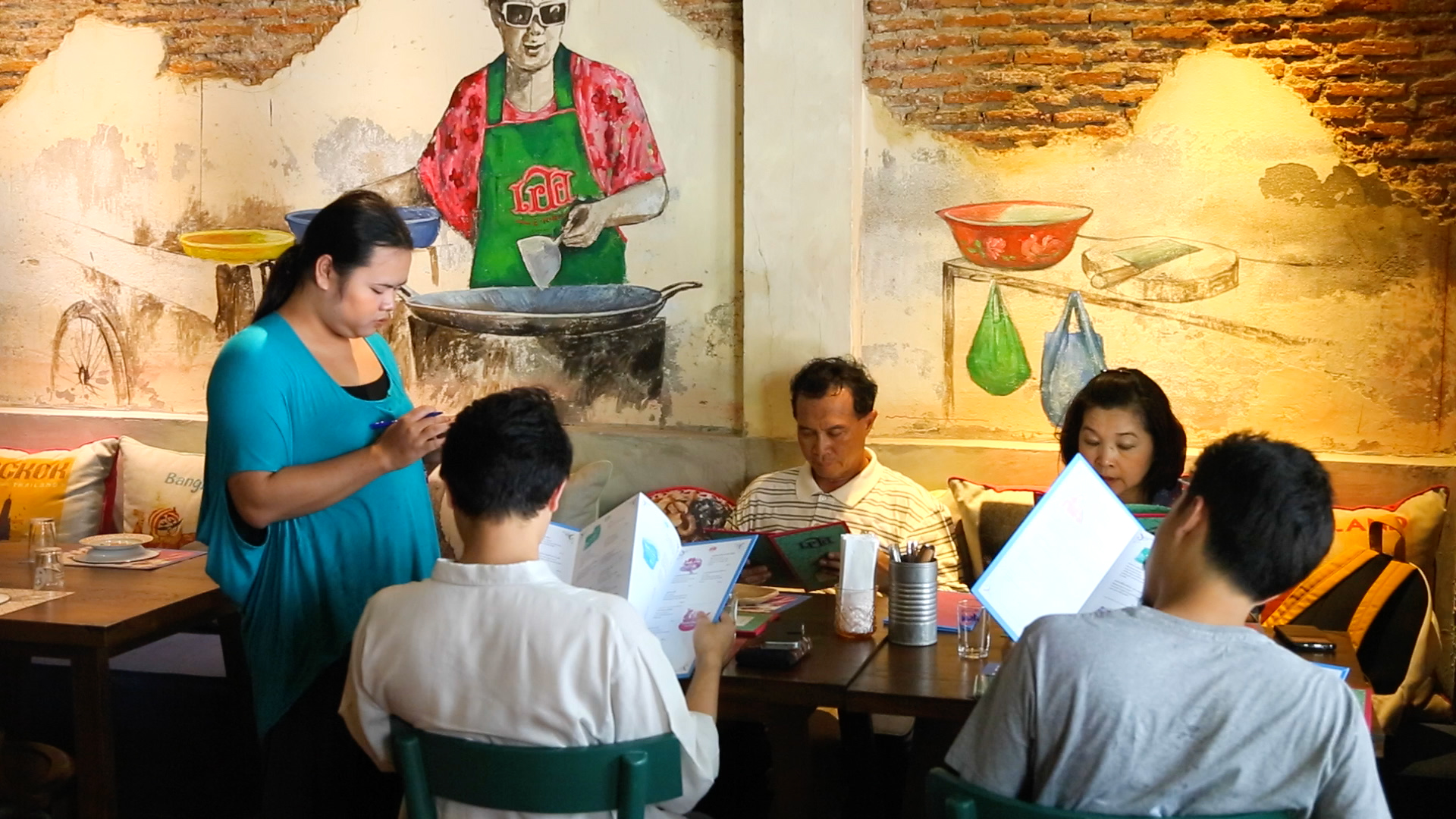People at a restaurant in Bangkok.