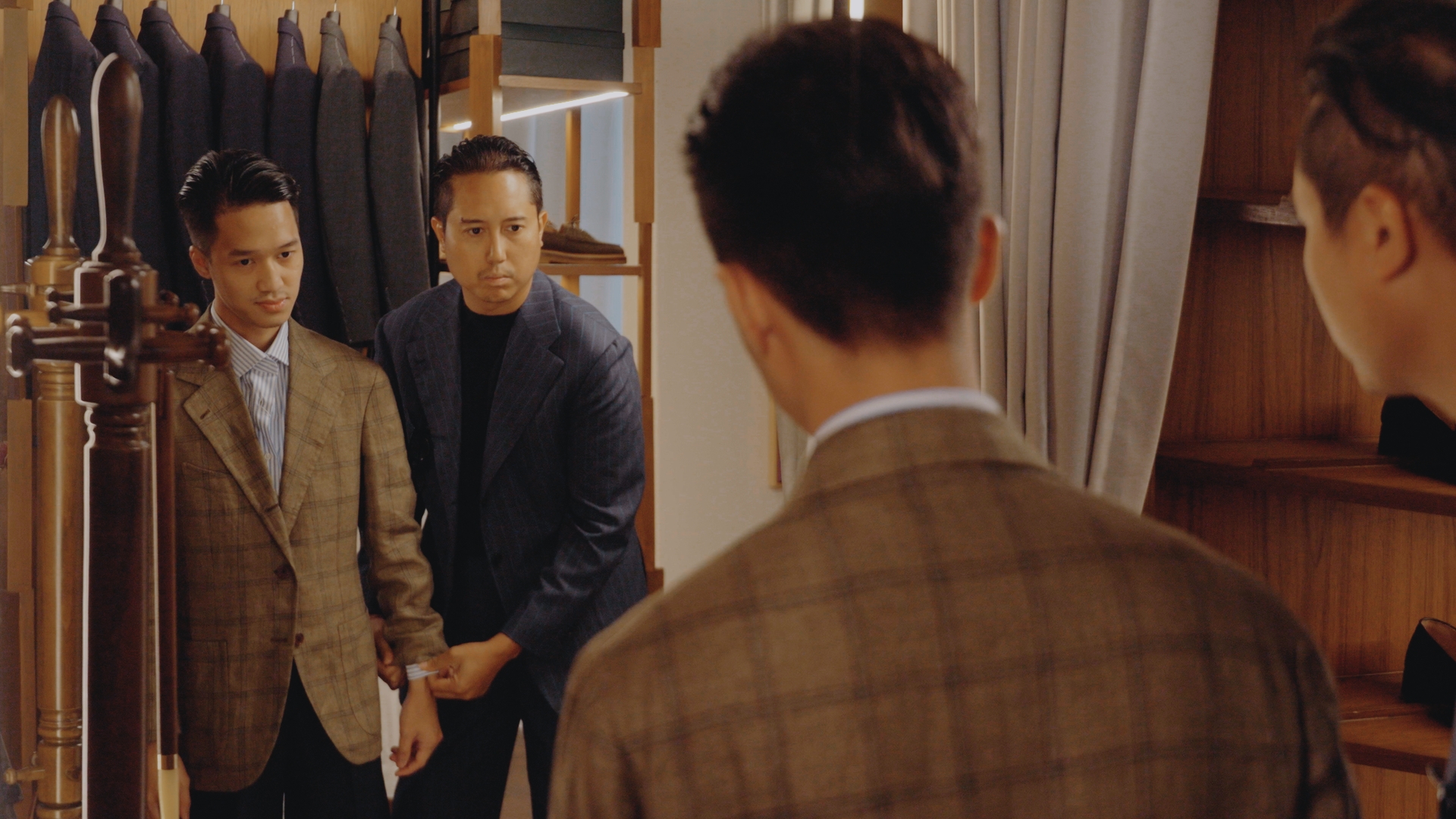 A customer trying on a jacket