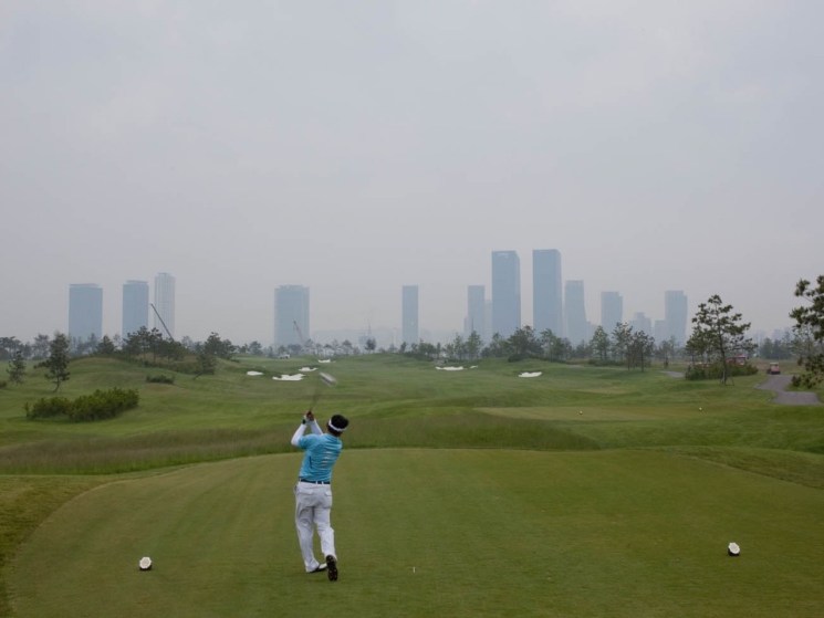 man playing golf