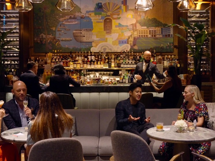 Bar with people drinking.