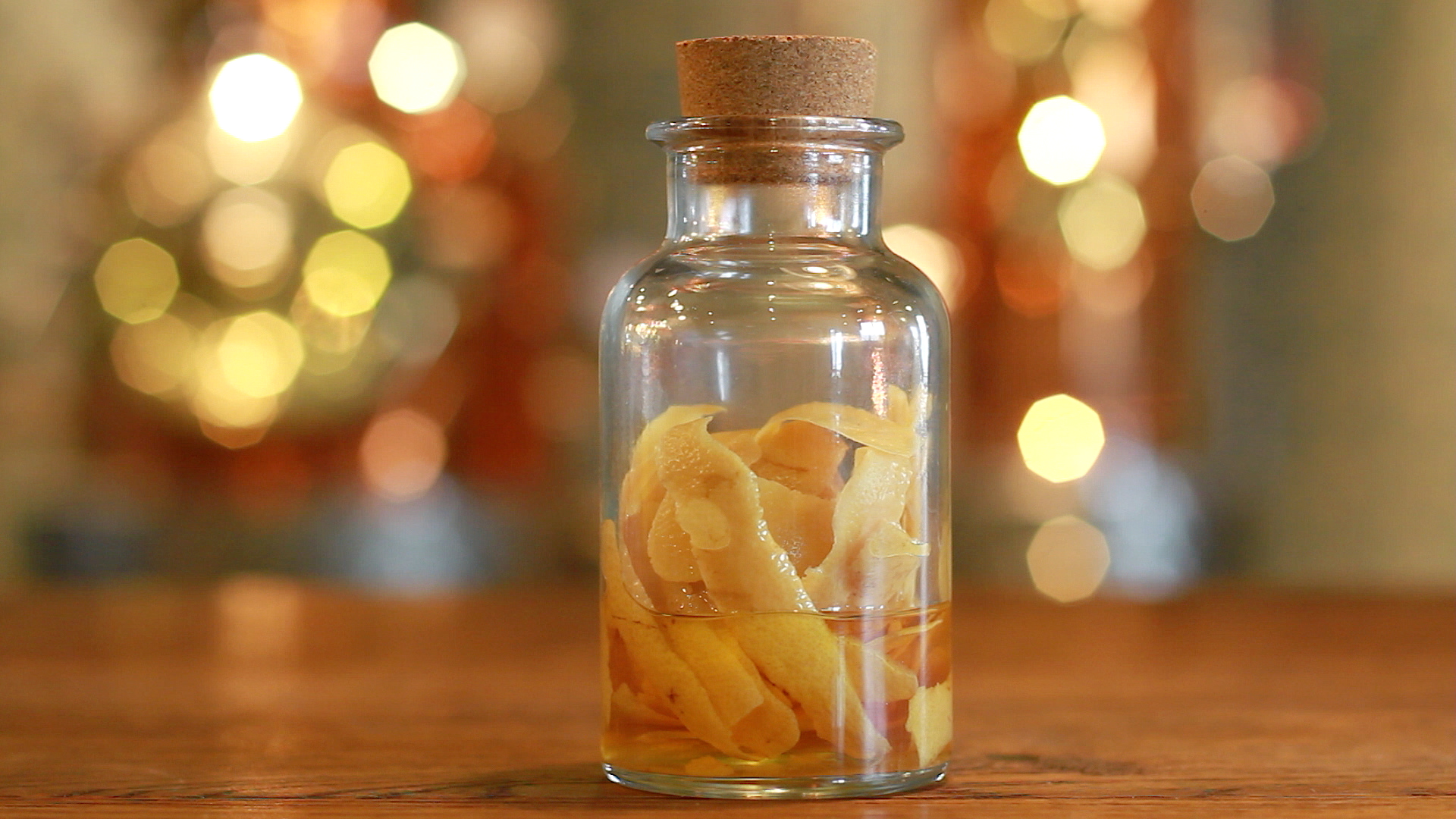 A bottle with gin ingredients.