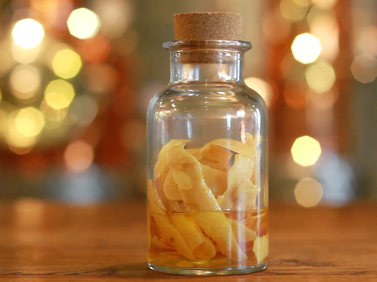 A bottle with gin ingredients.