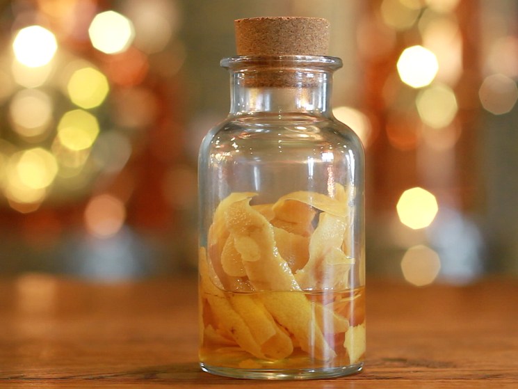 A bottle with gin ingredients.