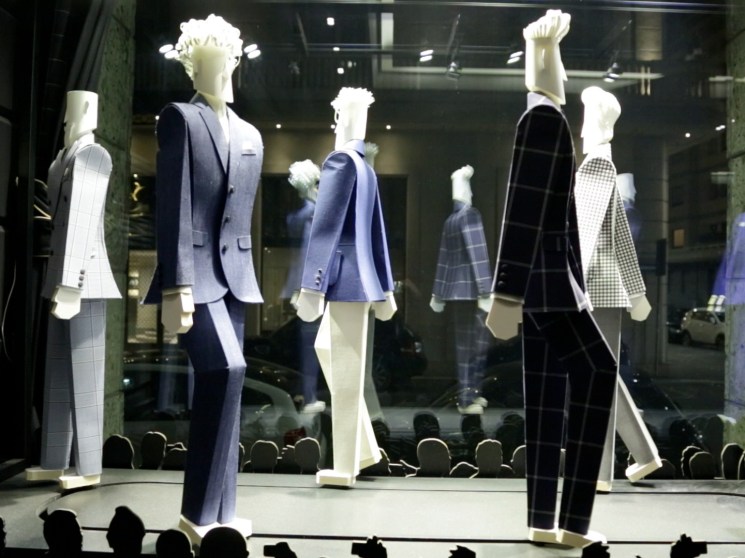 Window display with figurines.