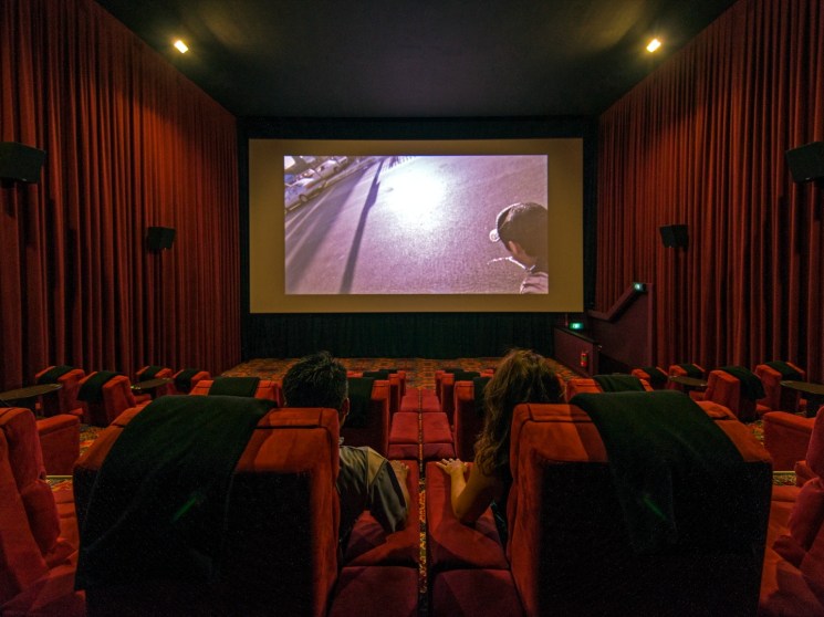 A film being screened at a cinema.