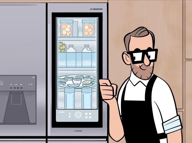 A man next to a refrigerator