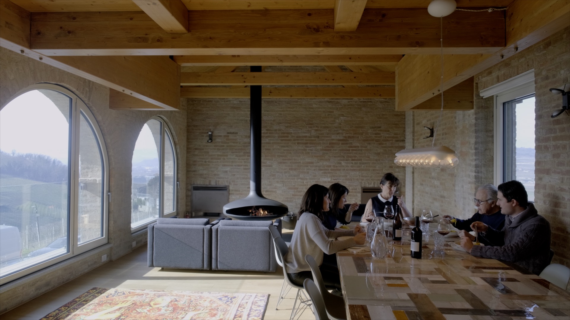 A family having lunch with wine.