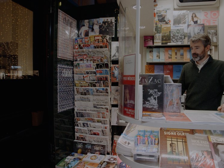 A seller inside a kiosk