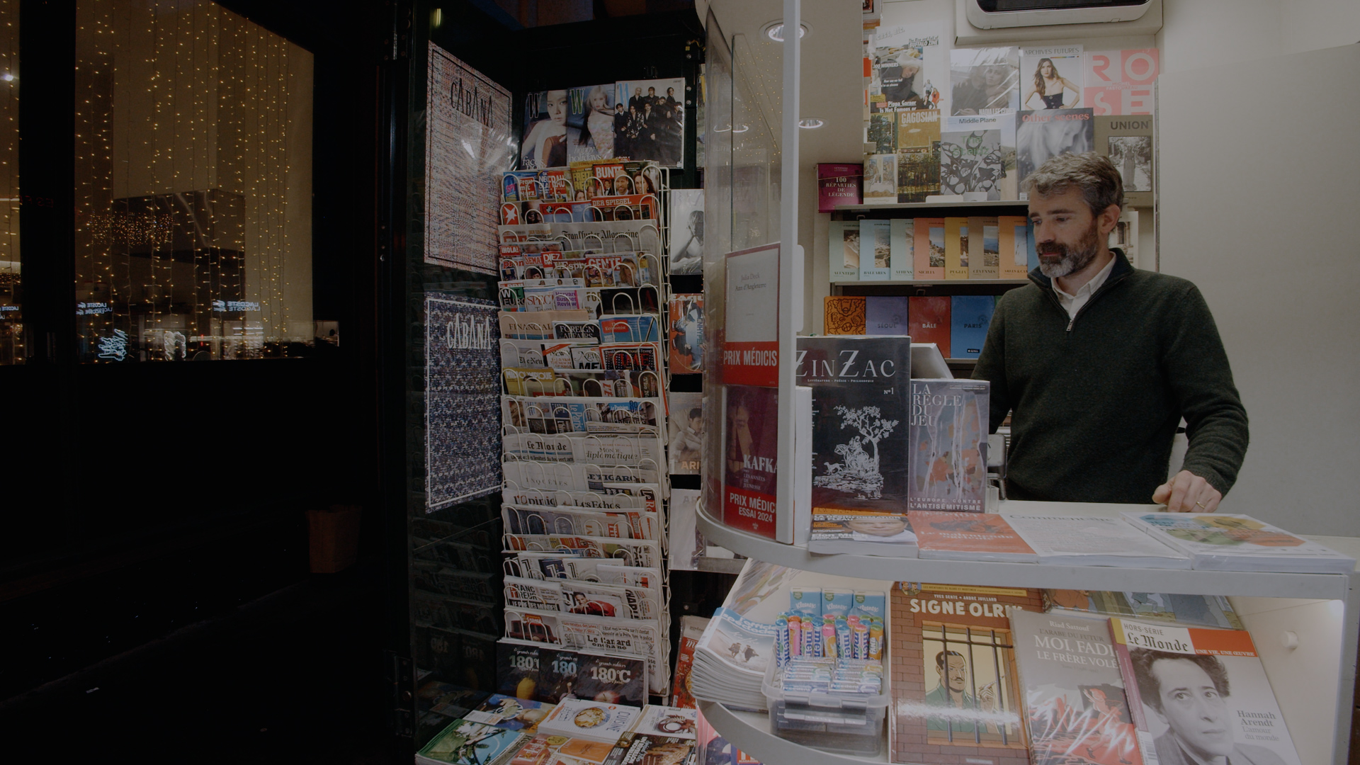 A seller inside a kiosk