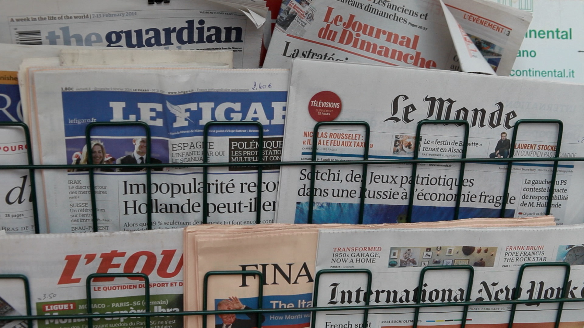 Daily press on a newsstand.