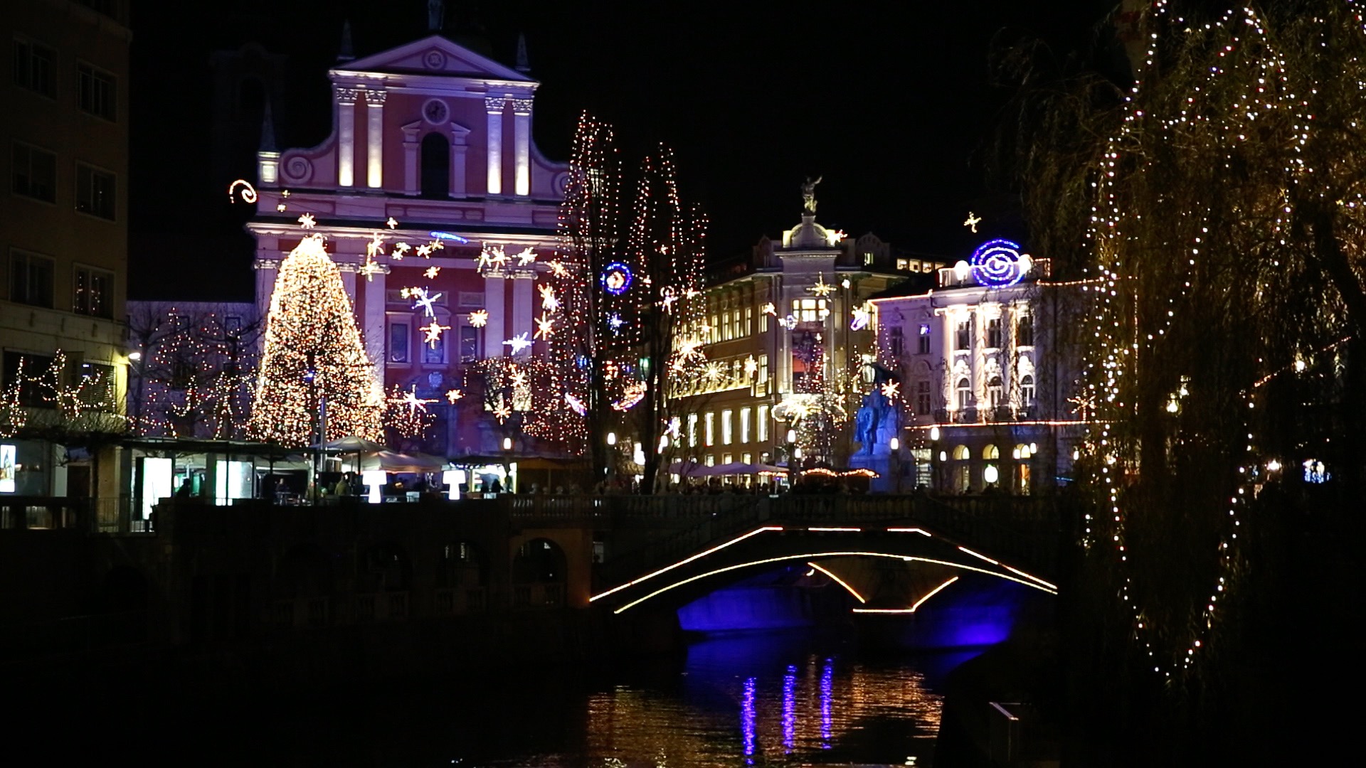 A street in Ljubljana lit up with Christmas decorations.