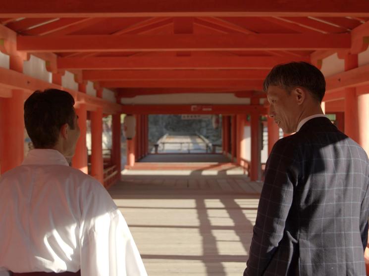 People walking in the Itsukushima shrine.