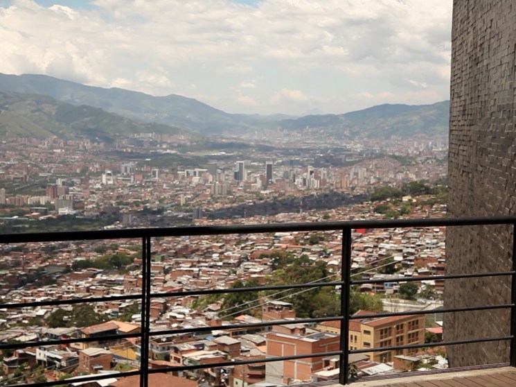 girl looking over city