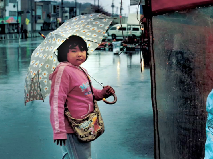 child with umbrella