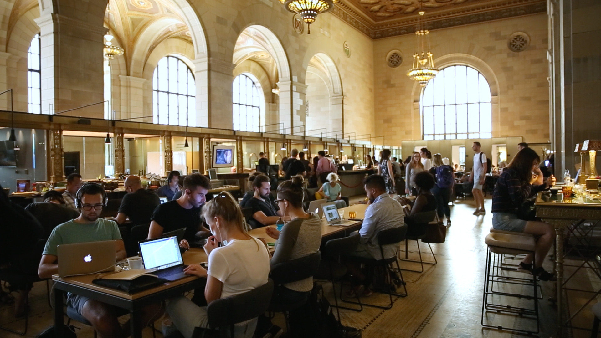 People working at Crew Collective & Cafe in Montreal.