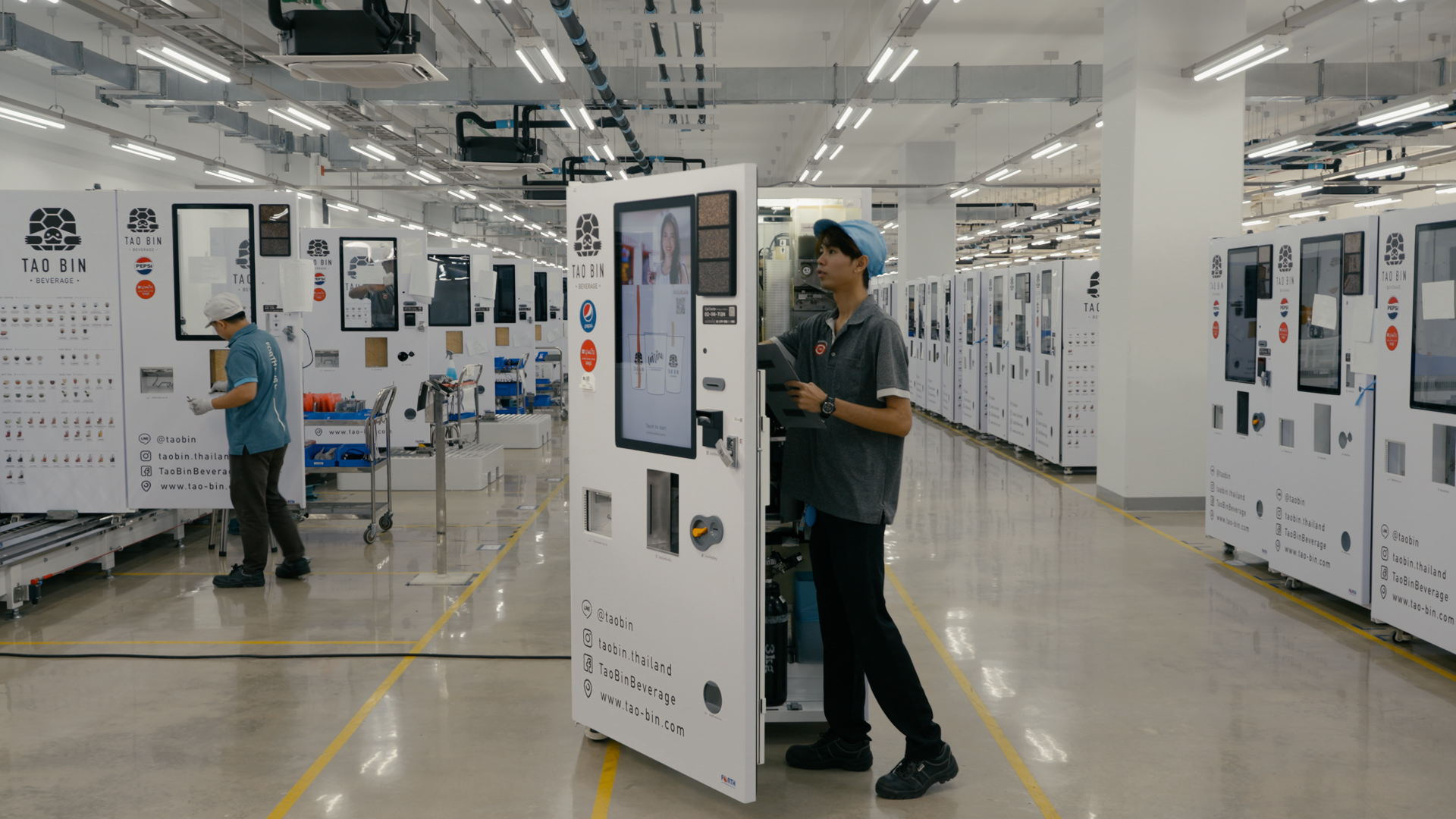 A technician looking inside a vending machine