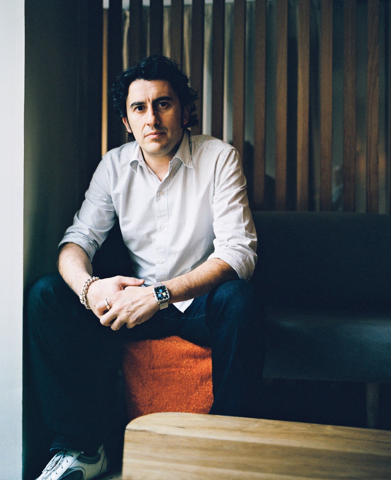 Rafa Anton, executive creative director at Leo Burnett, sitting at Ølsen restaurant in Madrid.