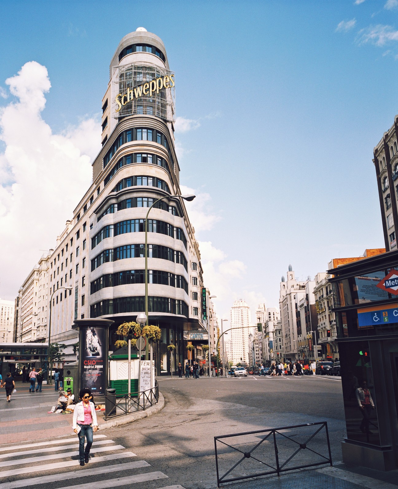 Carrión Cine Capitol building with distinctive cylindrical tower and Schweppes signage in Plaza Callao, Madrid.