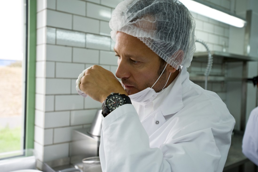 Jacob Marsing-Rossini tasting fresh, just-salted caviar roe at Desietra farm.