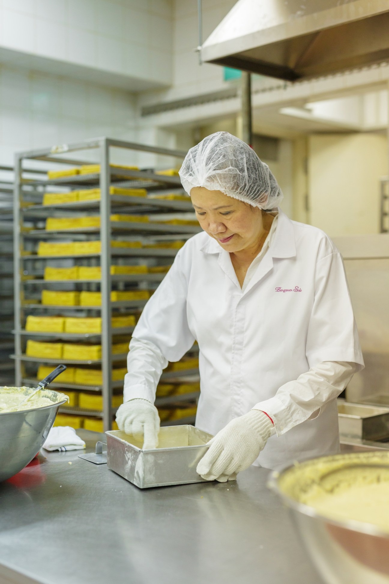 Anastasia Liew preparing kueh lapis in Bengawan Solo's central kitchen in Singapore.