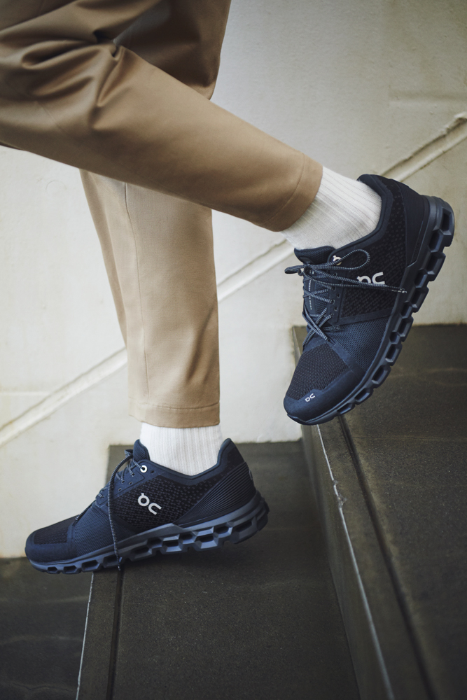 Athleisure look with modern trousers and performance trainers