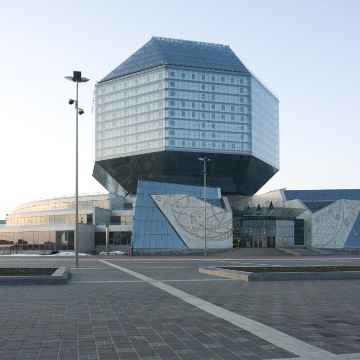 Modern National Library of Belarus building with distinctive inverted pyramid design and geometric relief panels.
