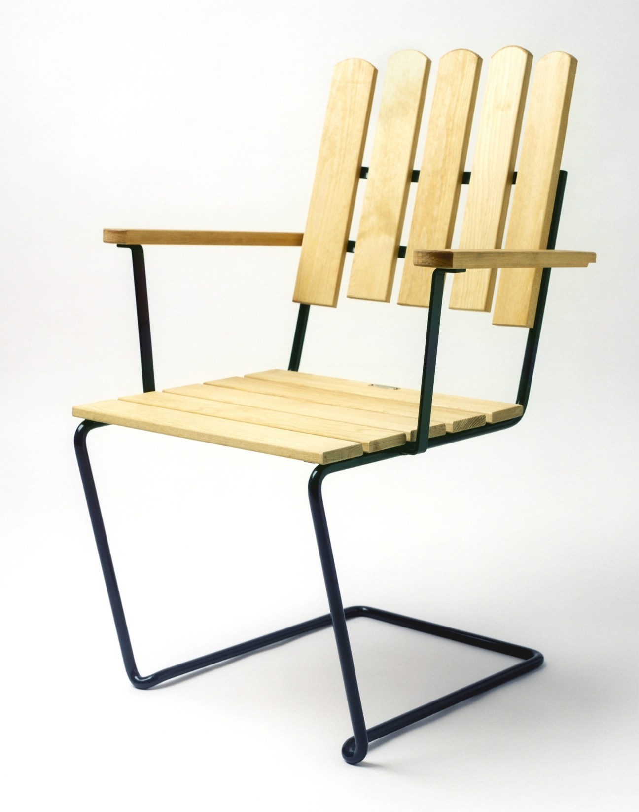 Modern chair with light wood slats and black metal frame in cantilever design.