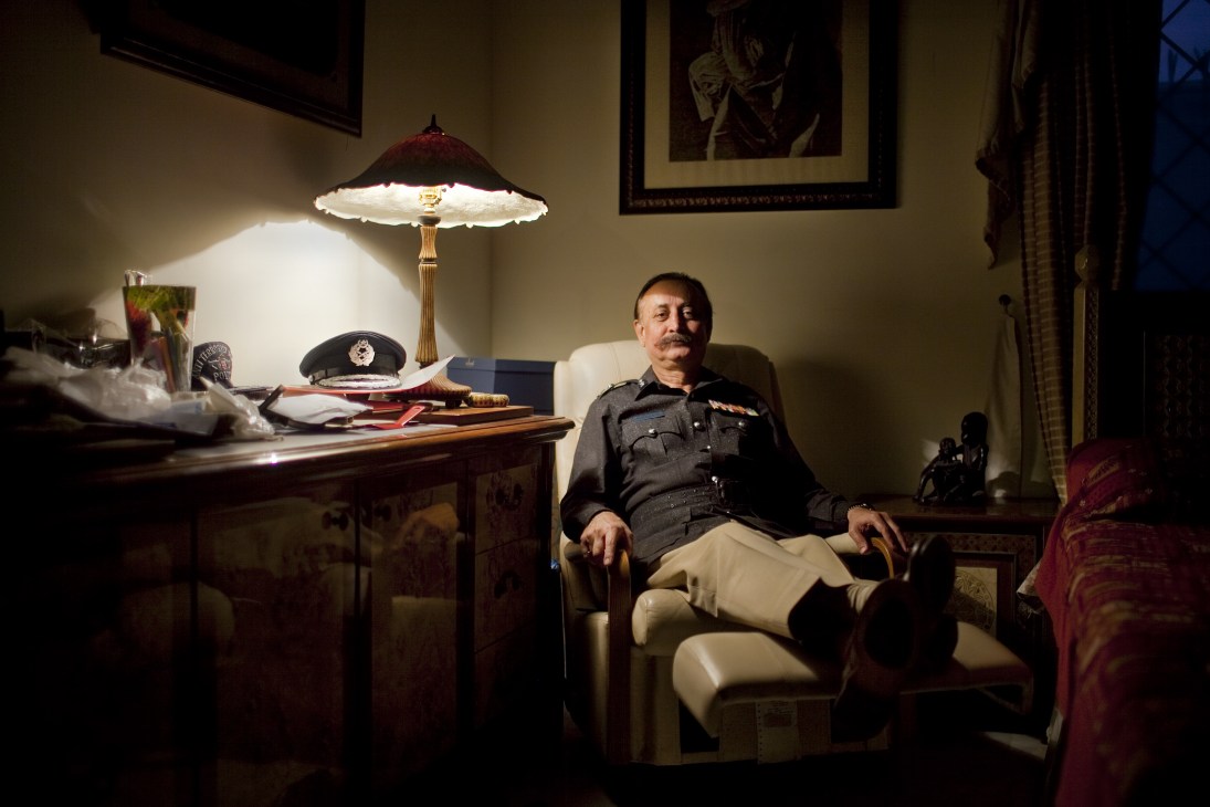 Waseem Ahmed, Karachi's police chief, sits in his favorite chair at home in the evening.