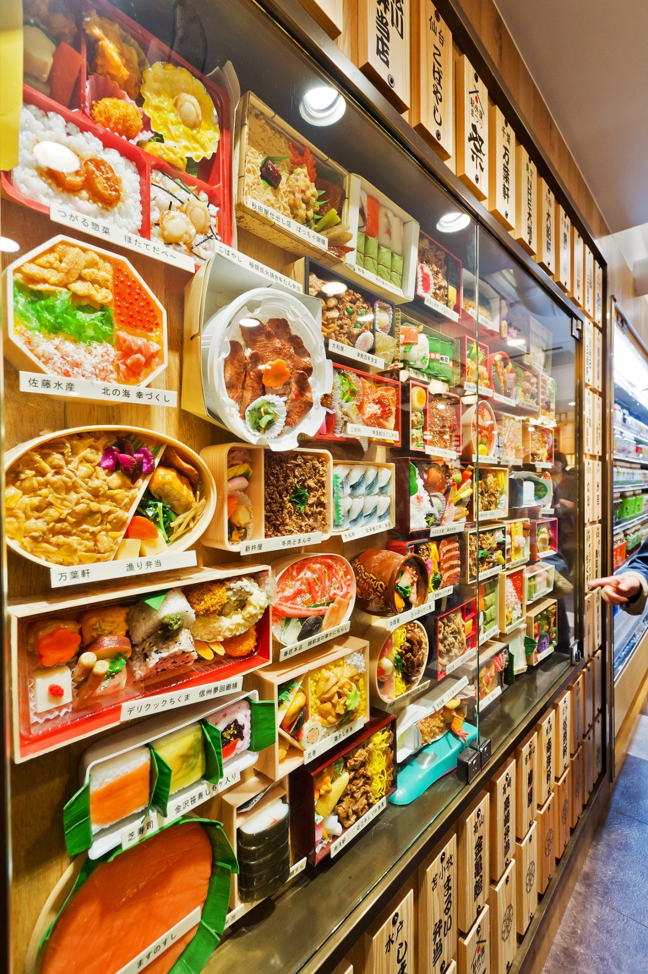 Display window of bento box meal samples at Ekibenya Matsuri in Tokyo station.