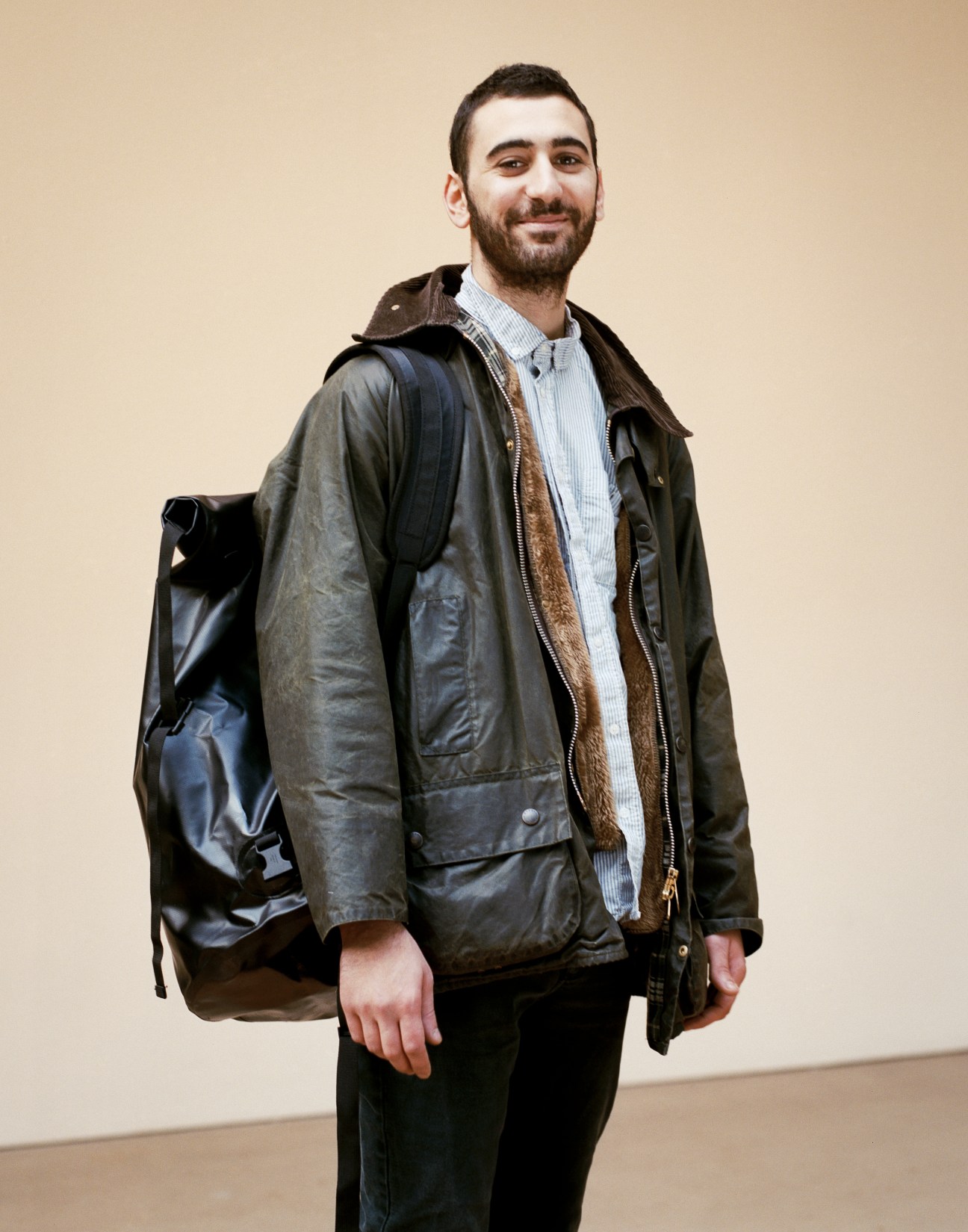 Daniele Giannetti, a Central Saint Martins BA Product Design student from Italy, wearing a dark jacket and blue shirt against a neutral background.