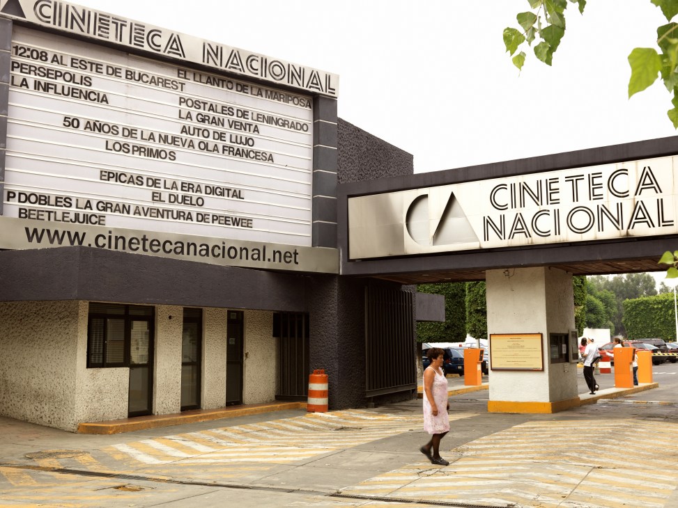 Exterior of Cineteca Nacional building with modernist architecture and marquee signage in Mexico City.
