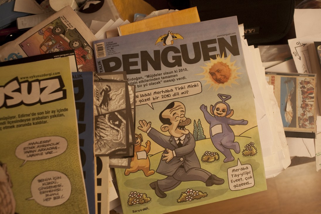 Penguen satirical magazine cover featuring a cartoon caricature of Recep Erdogan dancing with a character.