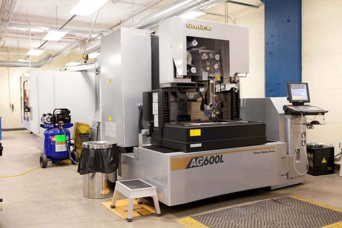 Industrial CNC machining equipment in a modern workshop facility.