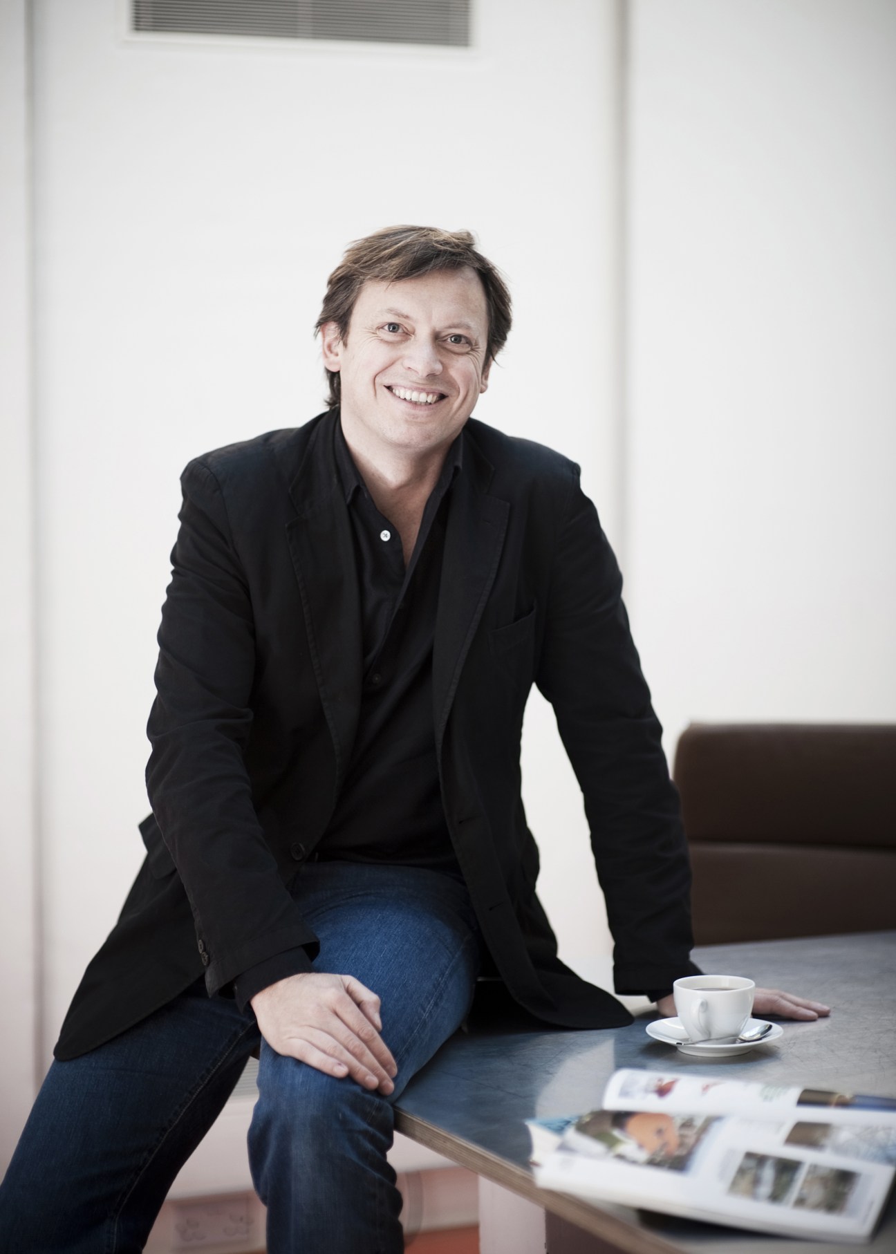 Morten Villiers Warren, founder of industrial design agency Native, smiling in a modern office setting.