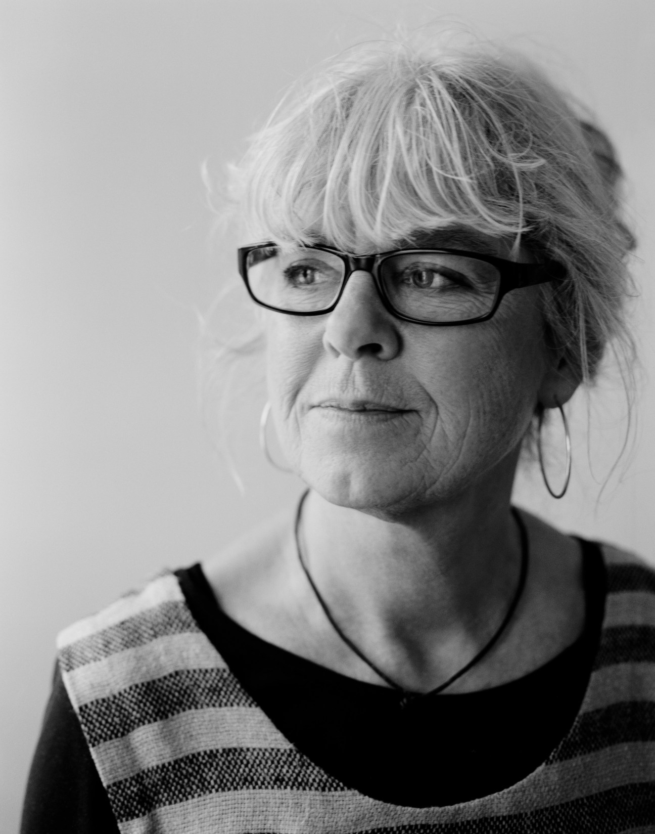 Louise Martin of Film i Väst, a woman wearing glasses and striped shirt