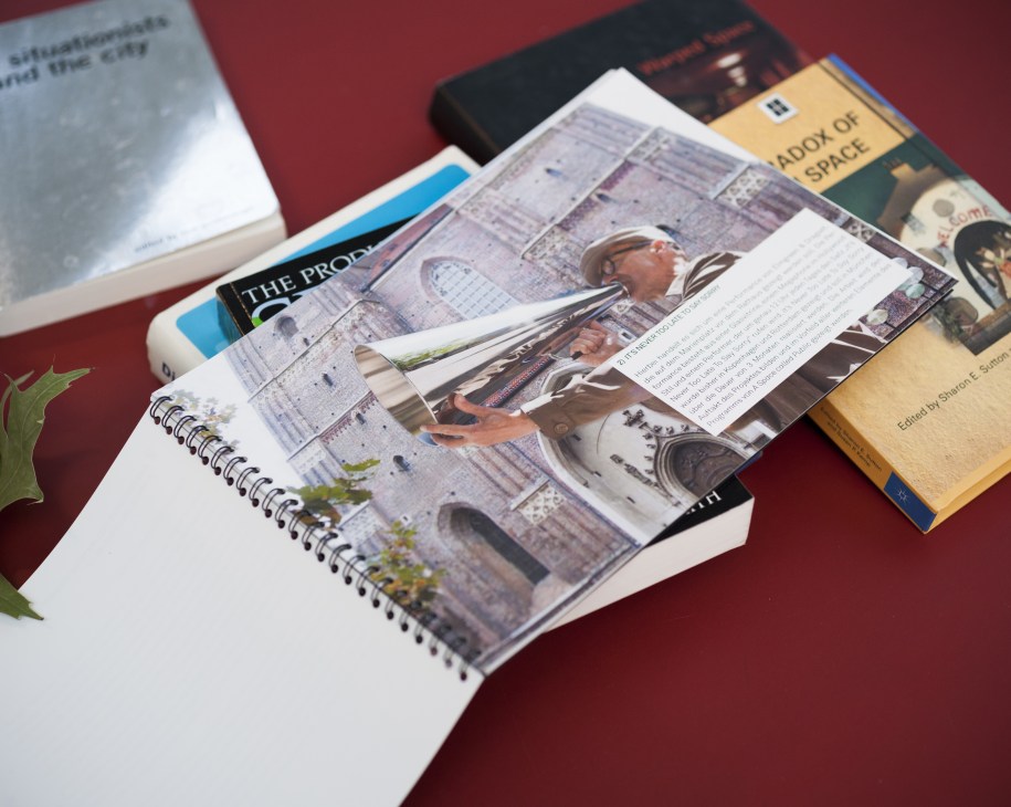 Open portfolio displaying photographs and text about Elmgreen + Dragset's project 'It's Never Too Late To Say Sorry'