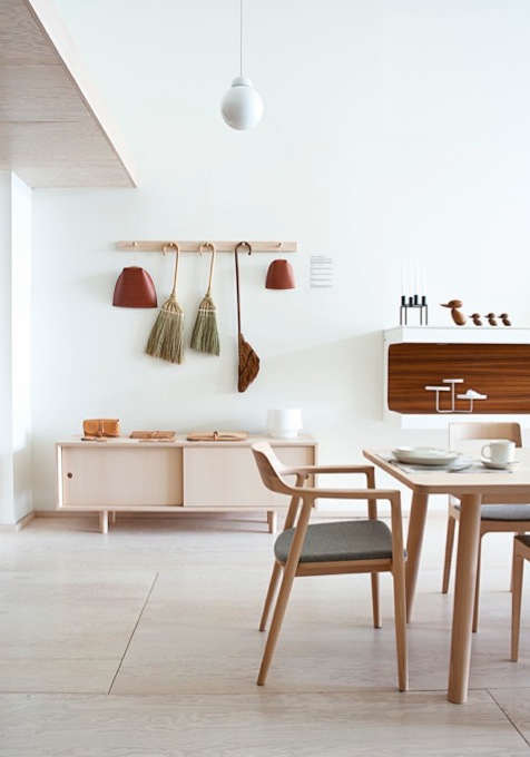 Minimalist interior of Mjölk design shop in Toronto showing Scandinavian furniture and decor.