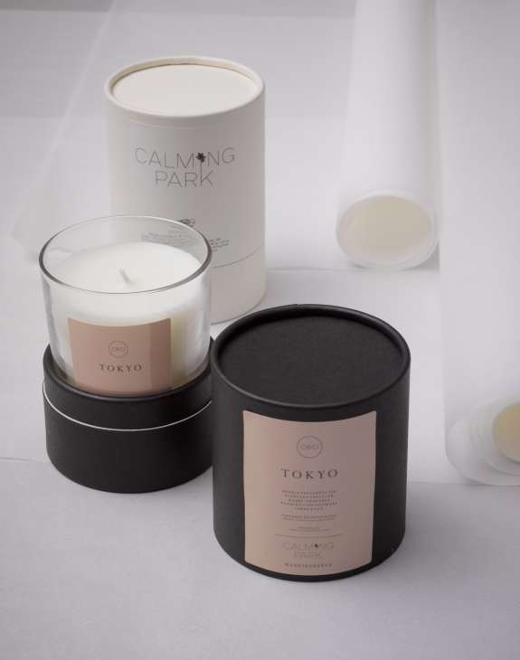 OeO x Calming Park Tokyo candles in glass and ceramic vessels with cream and black packaging.
