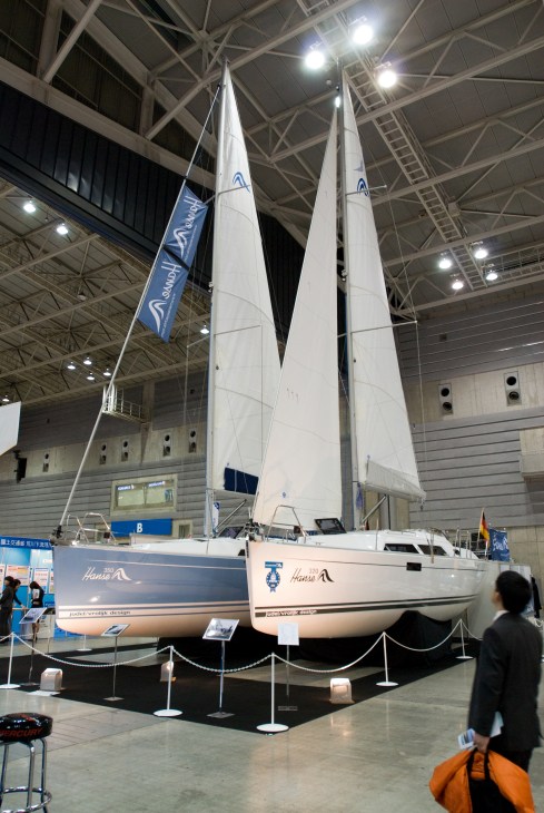 Hanse sailing yachts displayed indoors at the Japan International Boat Show in Yokohama.