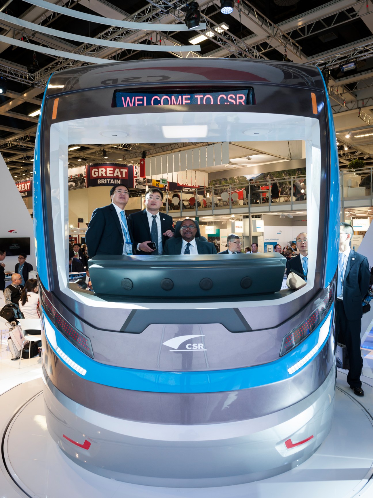 Officials inside CSR's tram-driving simulator at InnoTrans trade fair