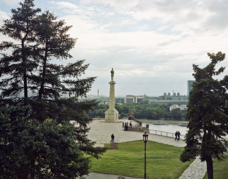 Kalemegdan Park in Belgrade with a monument overlooking the Danube River and cityscape