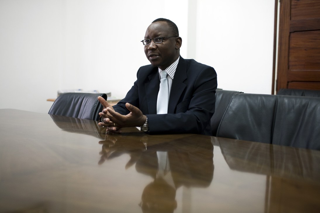 Daniel David, founder of Soico media group, sitting at a conference table in business attire.