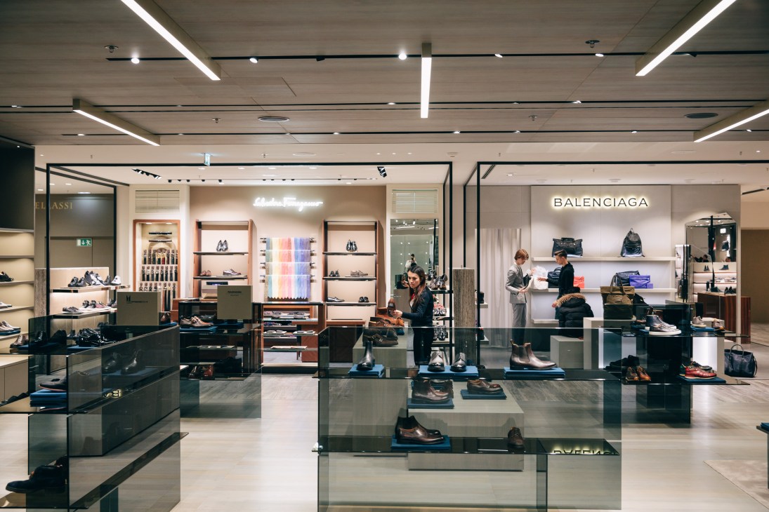 Kadewe's newly renovated men's accessories department with Balenciaga storefront and modern display cases.