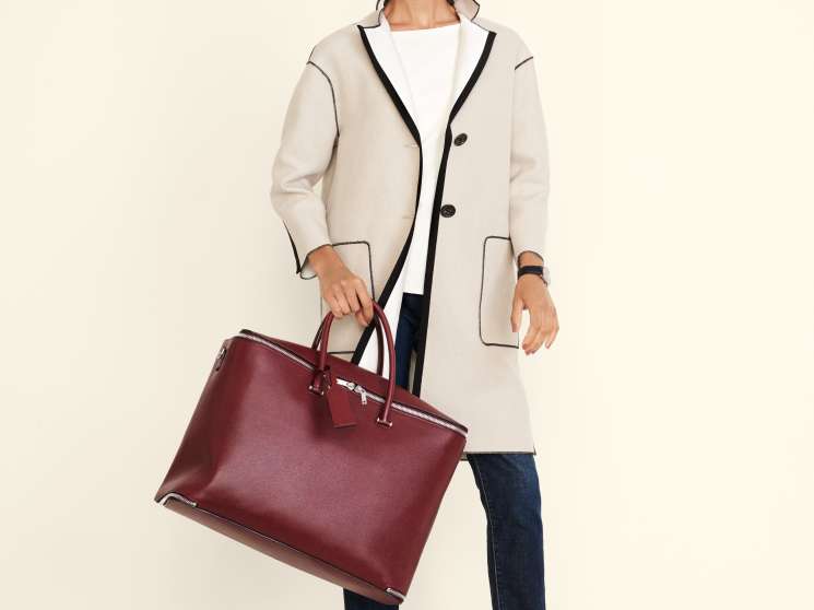 Model wearing Agnona coat, Cos pullover, Roy Roger's jeans, GH Bass shoes, Hermès watch and Valextra bag.