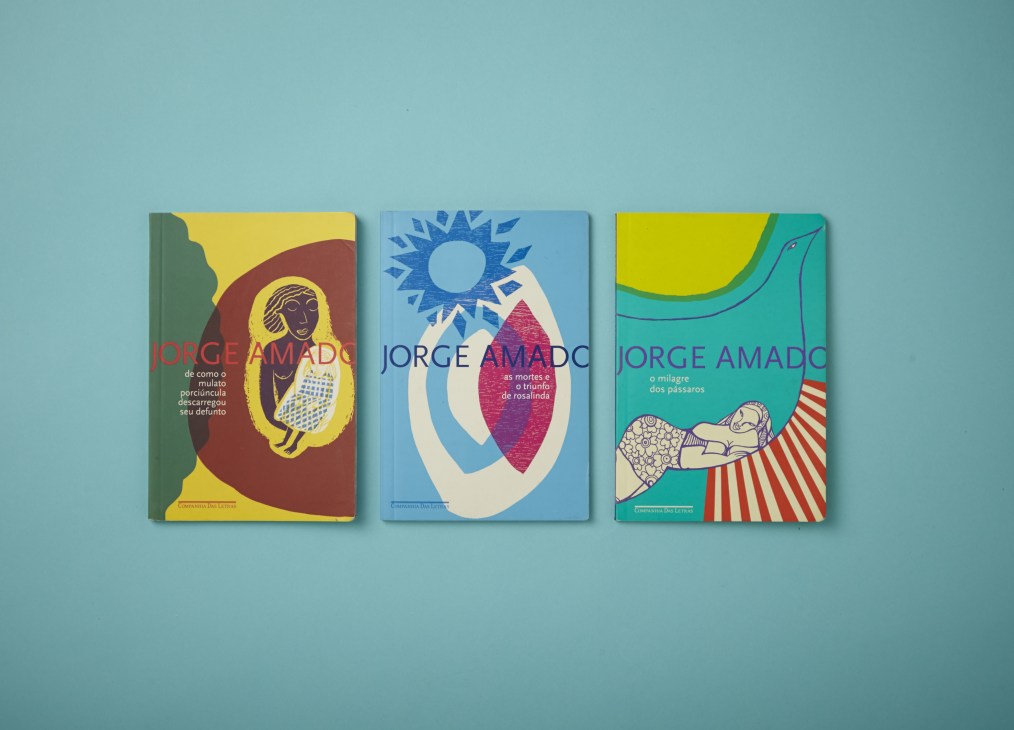 Three colorful Jorge Amado book covers with vibrant illustrations on a light blue background.