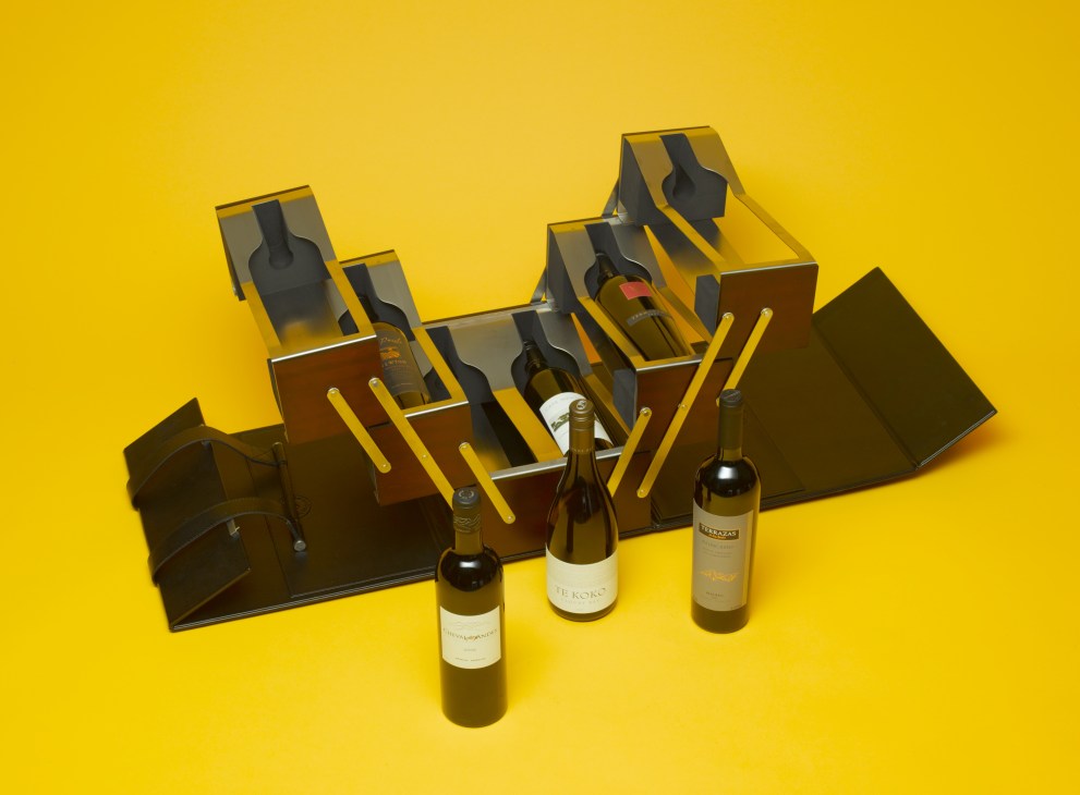 Estates & Wines Ultimate Collection wine box with six bottles displayed on yellow background.