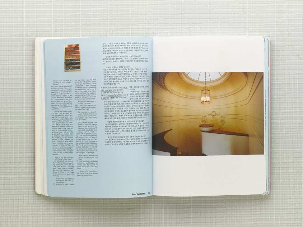 Open magazine spread showing bilingual English and Korean text with interior design photography and a wooden storage shelf illustration.